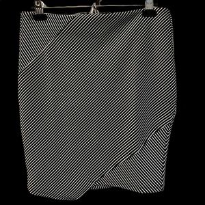 Stretch material Black and white striped skirt.